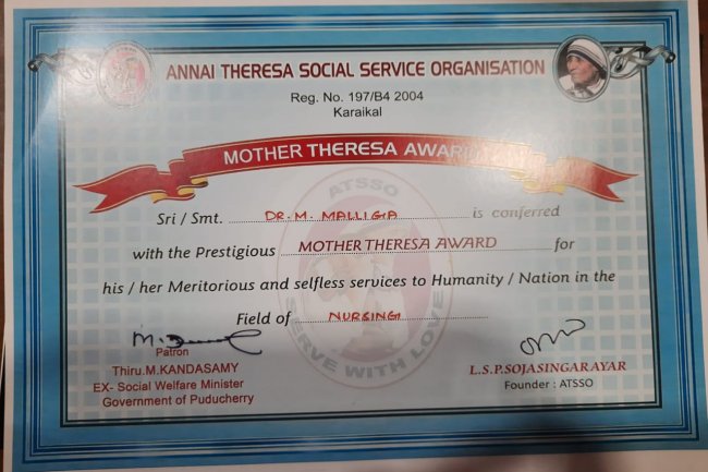 Dr. Prof. MalligaKannan, Principal of Indirani College of Nursing is conferred with the prestigious Mother Theresa Award - Indirani College of Nursing, Ariyur, Puducherry 605 102.